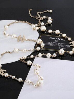 Chanel Elegant Gold and Pearl Necklace